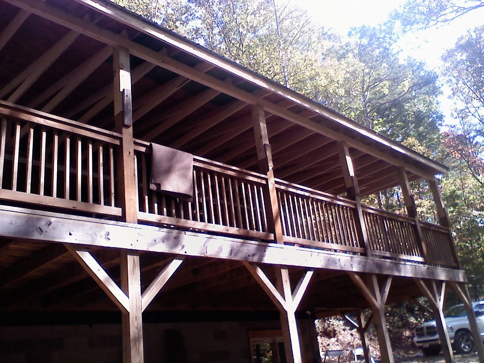 Timber framing under a new elevated porch and deck — Roof Leak Repair in Hayden by Roofing Brothers